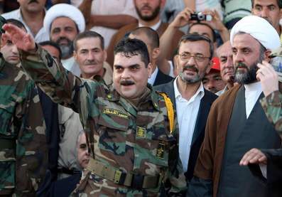Samir Kuntar on arrival in Lebanon, complete with Hizbullah uniform and Heil Hitler nazi scumbag salute (AFP).